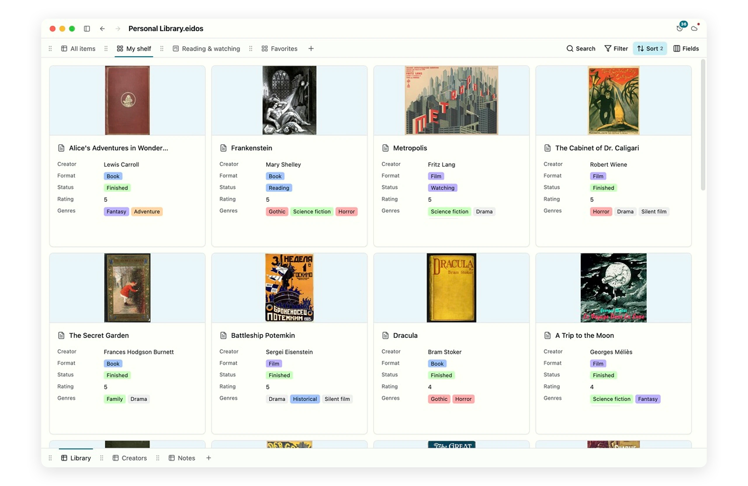 Eidos Lite Gallery view showing books and films as visual cards with covers and typed metadata